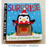 Surprise: A Book of Christmas Shapes Board book
