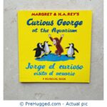 Curious George at the Aquarium (Spanish and English)