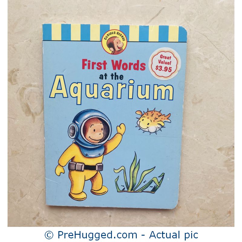 First Words at the Aquarium (Curious George) Board book