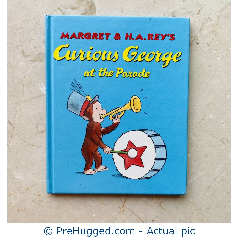 Curious George At The Parade – Hardcover